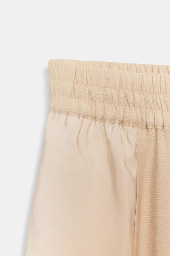 Pantalon coupe barrel contrasté
