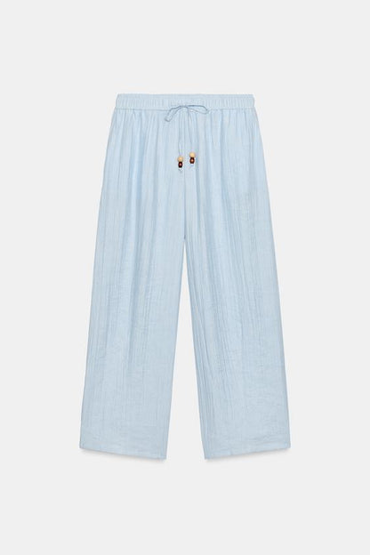 Pantalon coupe barrel texturé