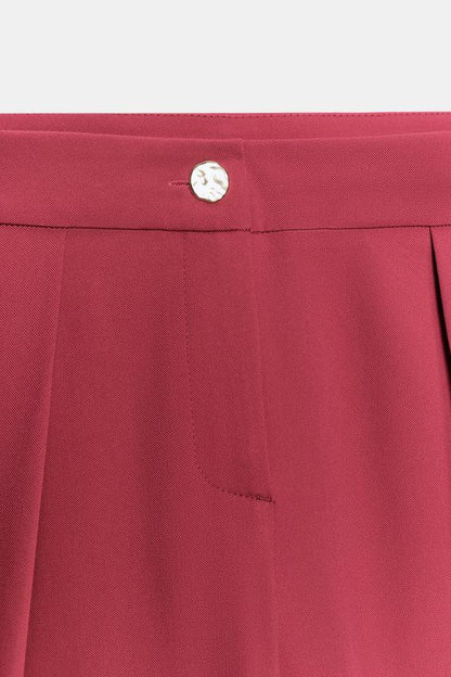 Pantalon carotte à plis