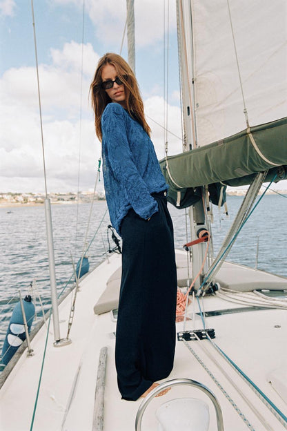 Pantalon palazzo à bouton doré