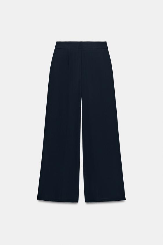 Pantalon palazzo à bouton doré