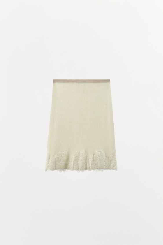 Jupe midi en maille et dentelle brodée