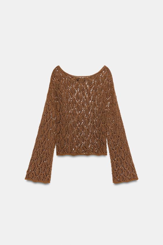 Pull en maille ajourée à manches évasées