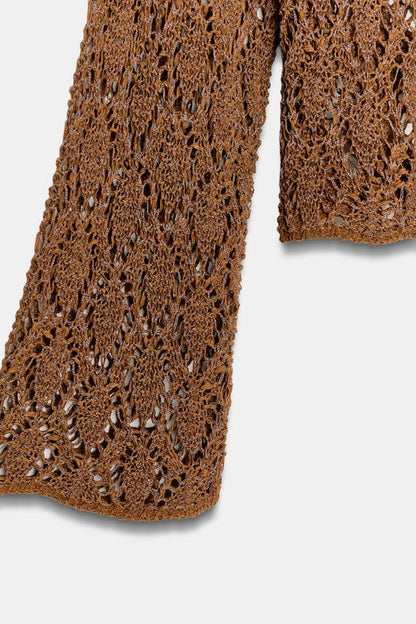 Pull en maille ajourée à manches évasées