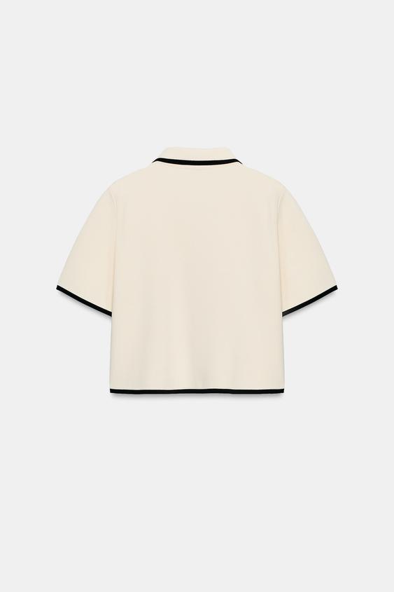 Veste en maille à manches courtes à passepoils contrastés