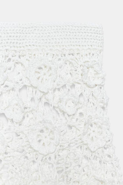 Jupe midi en maille crochetée à fleurs