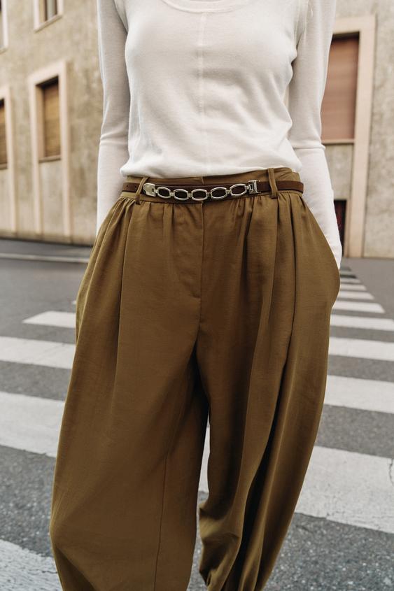 Pantalon bouffant avec ceinture chaîne
