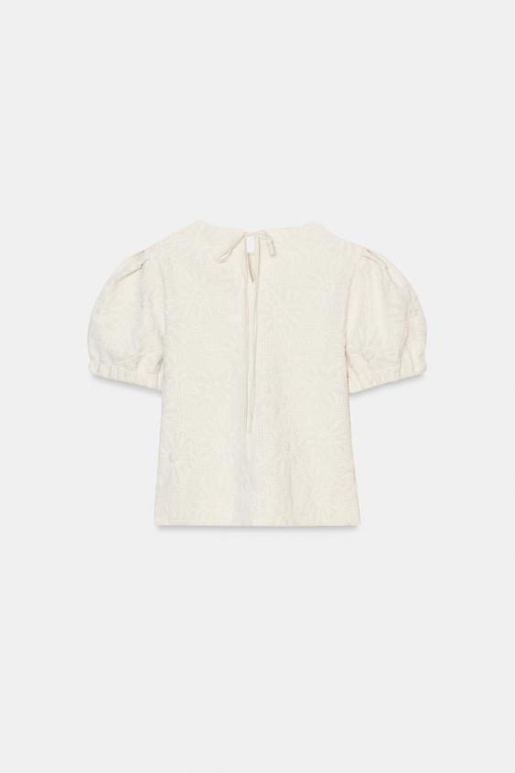 Top en maille à manches bouffantes