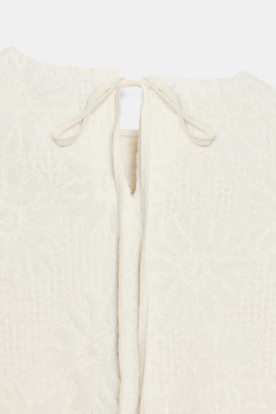 Top en maille à manches bouffantes