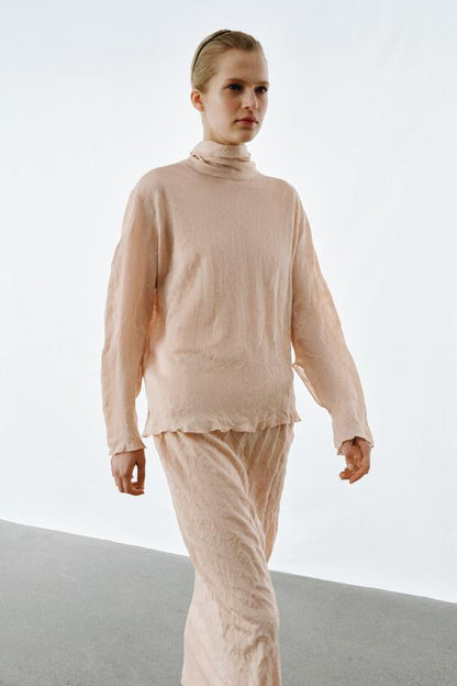 Jupe midi en maille effet froissé