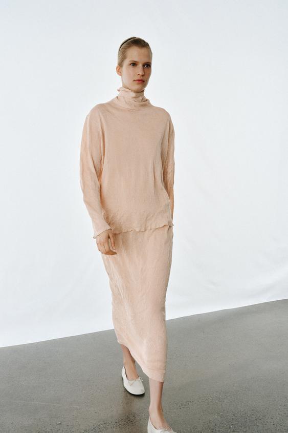 Jupe midi en maille effet froissé