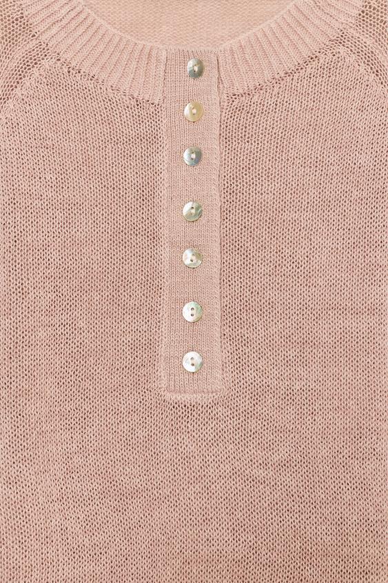 Pull en maille à boutons