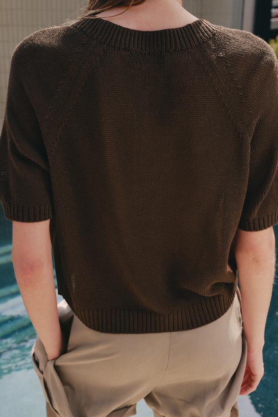 Pull en maille à manches courtes à boutons