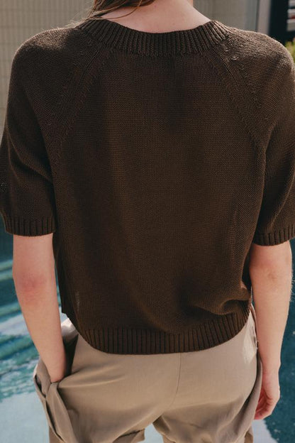 Pull en maille à manches courtes à boutons