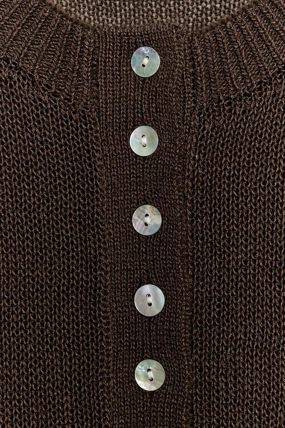 Pull en maille à manches courtes à boutons