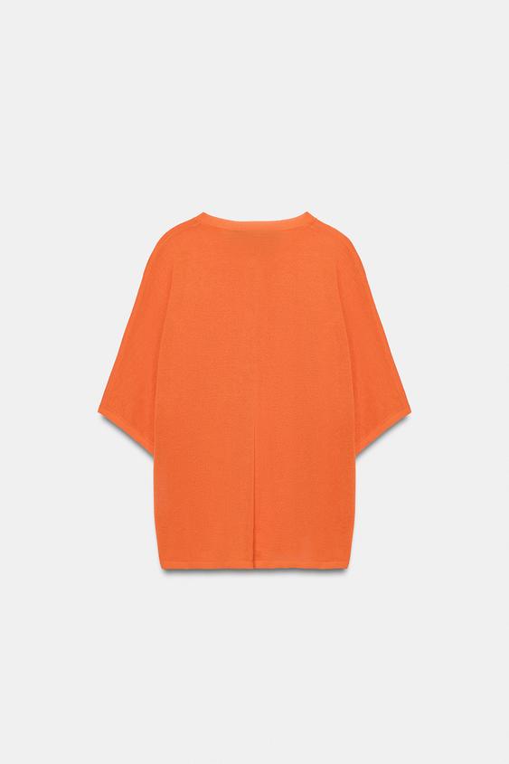 Veste en maille à manches courtes