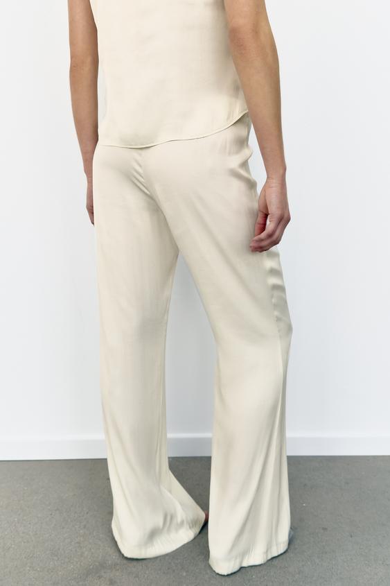 Pantalon coupe évasée satiné