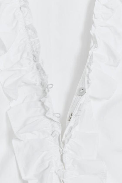 Top en nylon à volants