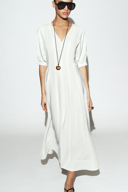 Robe midi à manches bouffantes