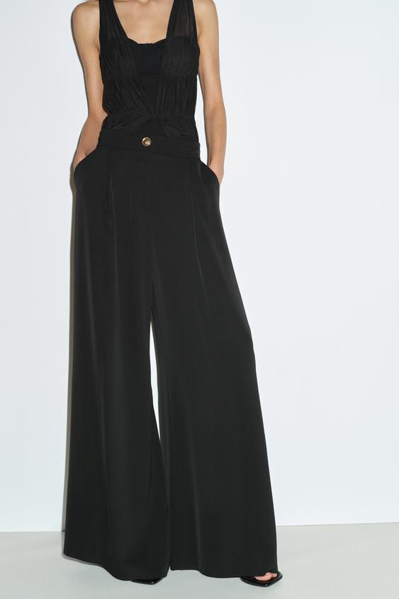 Pantalon palazzo à bouton doré