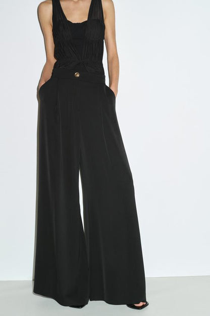 Pantalon palazzo à bouton doré