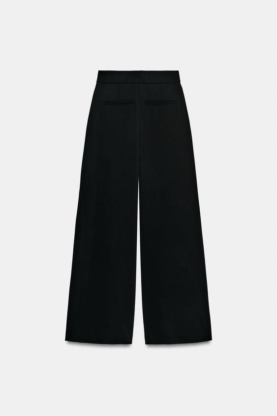 Pantalon palazzo à bouton doré