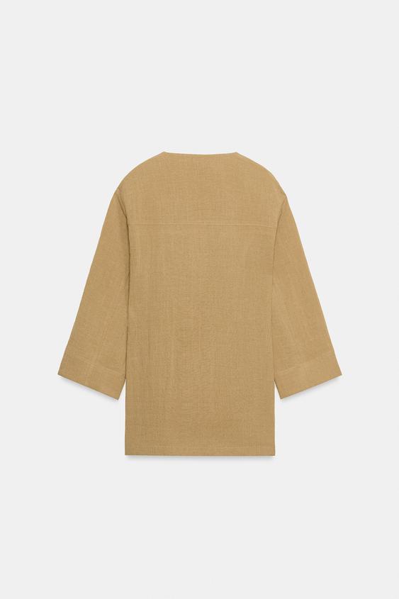 Veste d’ensemble croisée à fentes latérales