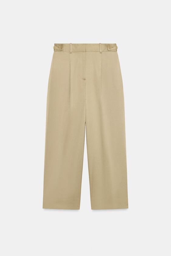 Pantalon taille basse à passants latéraux