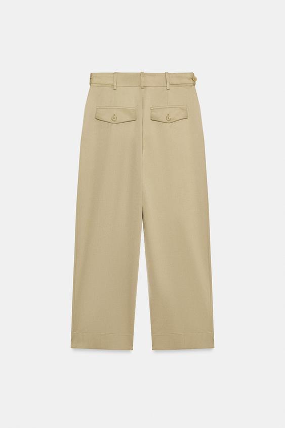 Pantalon taille basse à passants latéraux