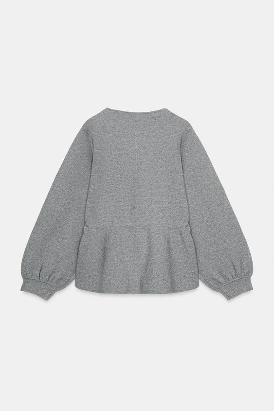 Pull en maille à cordon