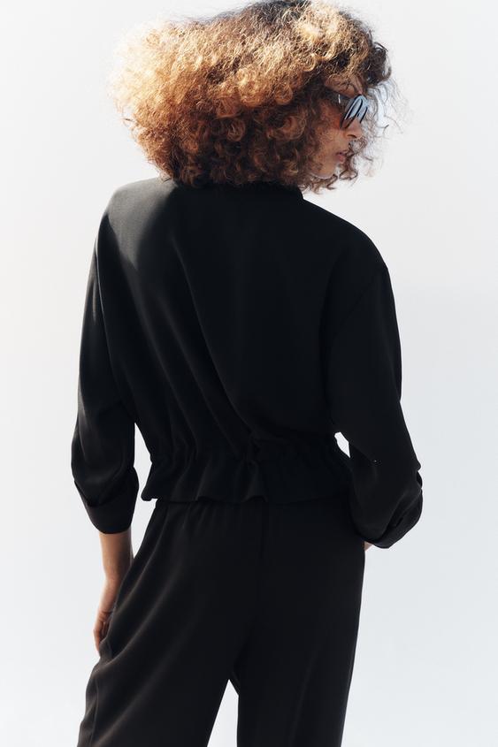 Veste safari à manches retroussées