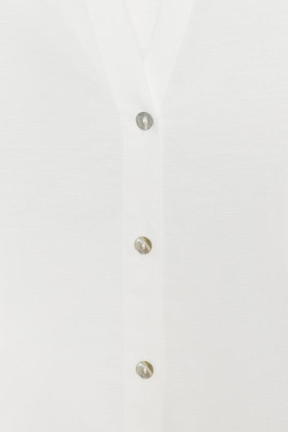 Chemise à manches bouffantes en lin