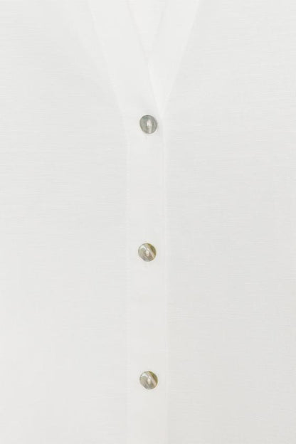 Chemise à manches bouffantes en lin
