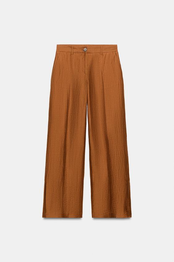 Pantalon fluide en lin à fentes au bas