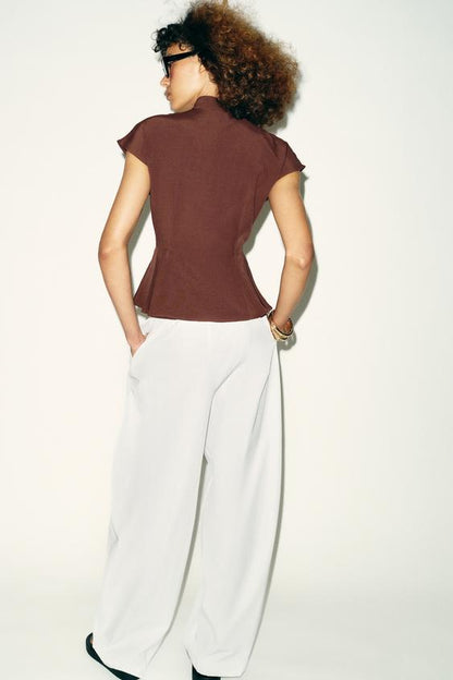 Top peplum à pinces