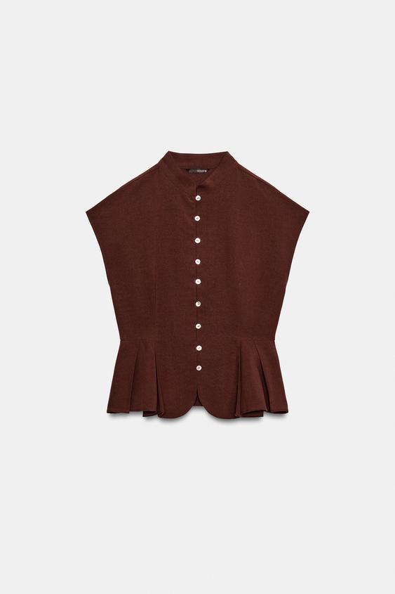Top peplum à pinces