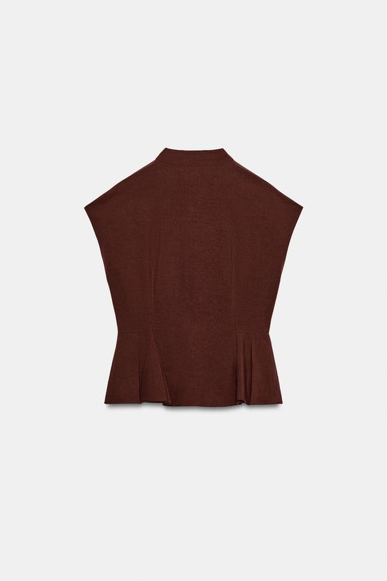 Top peplum à pinces