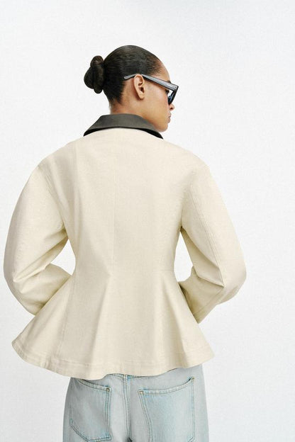 Blouson peplum à col contrasté