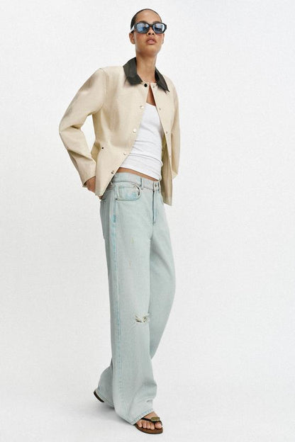 Blouson peplum à col contrasté
