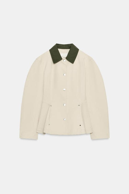 Blouson peplum à col contrasté
