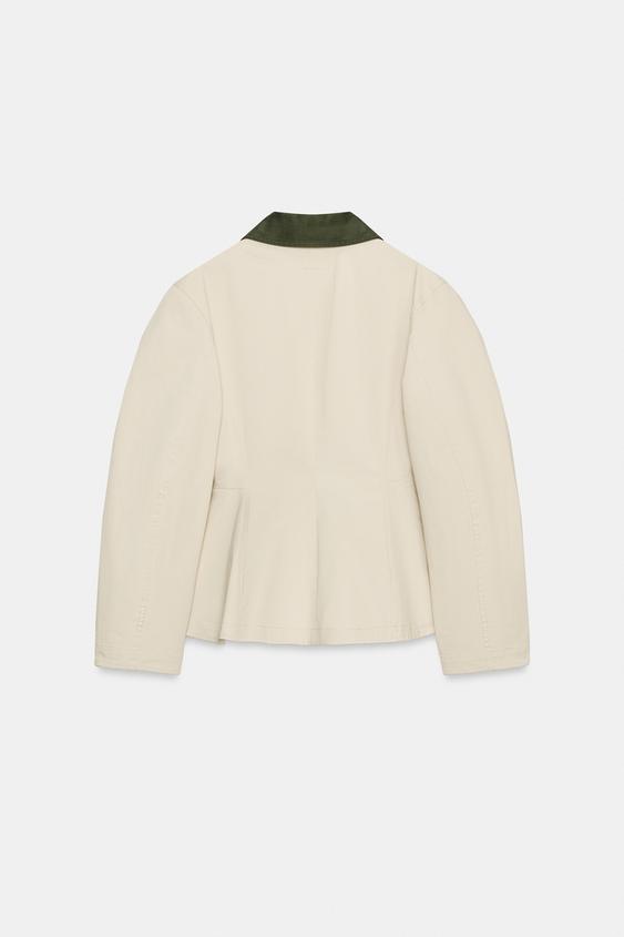 Blouson peplum à col contrasté