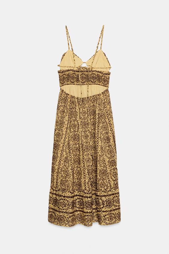 Robe midi brodée ajourée à découpes