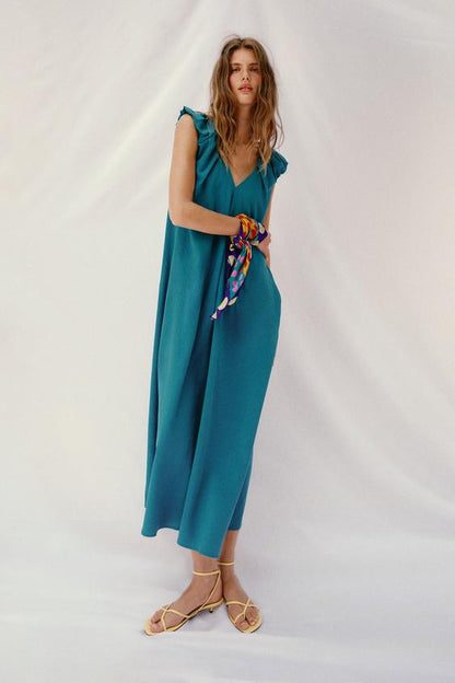 Robe longue à épaules marquées