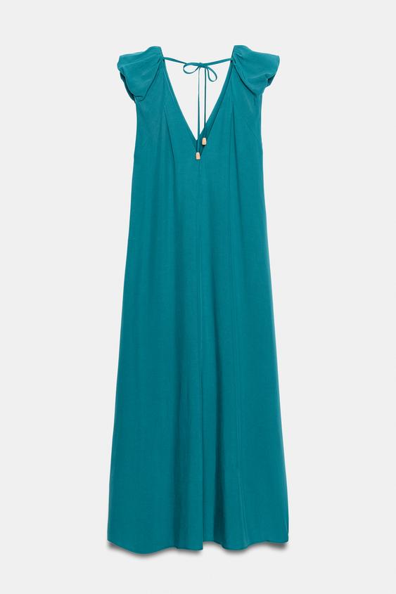Robe longue à épaules marquées