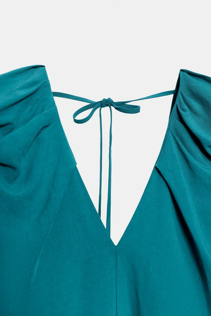 Robe longue à épaules marquées
