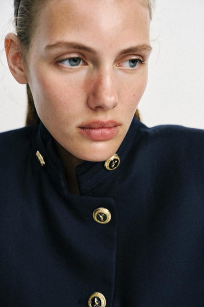 Blazer cintré à bouton doré