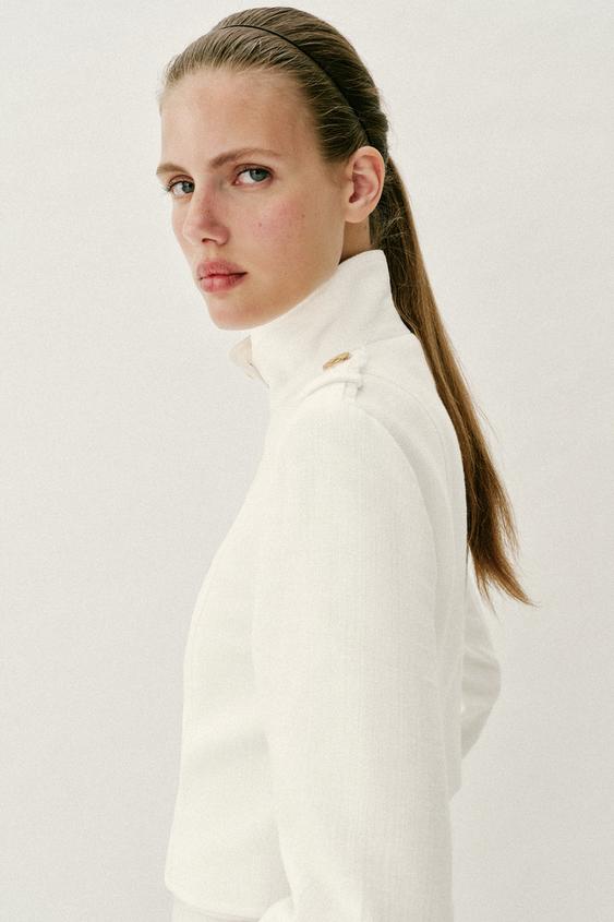 Veste croisée à bouton doré