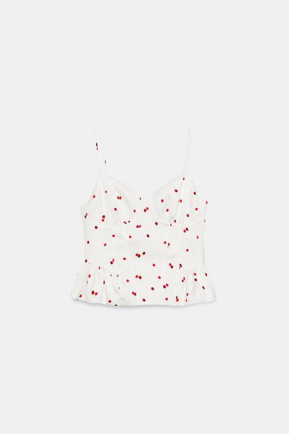 Top satiné à volants et motif fraises