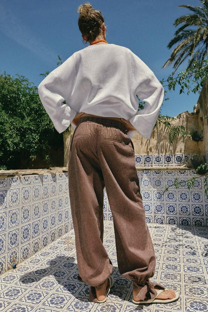 Pantalon bouffant avec nœuds en lin
