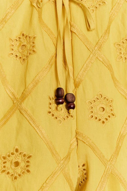 Bermuda à broderies ajourées
